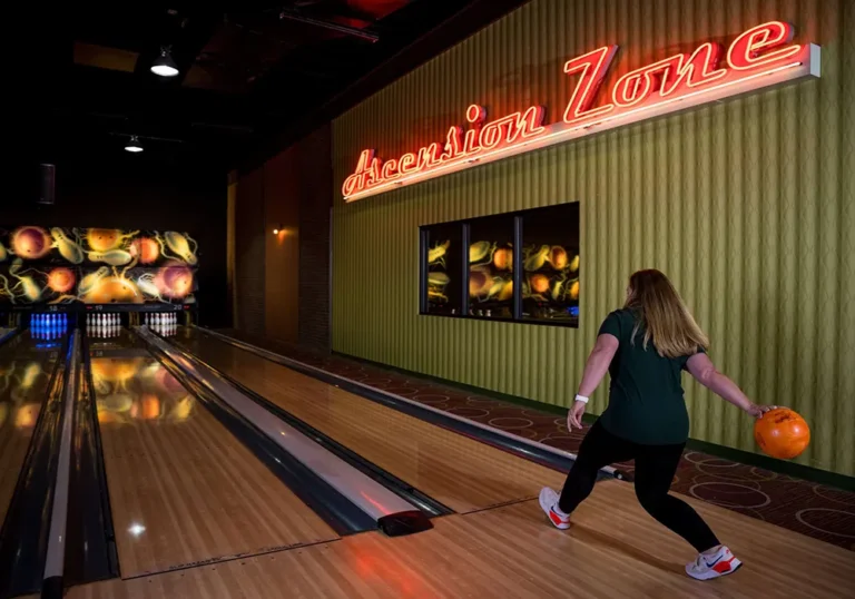woman bowling at Premier LAnes